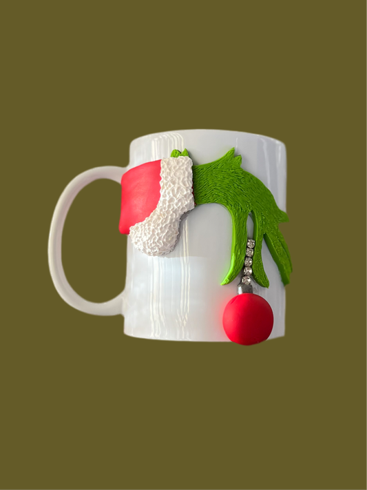 Grinch hand mug